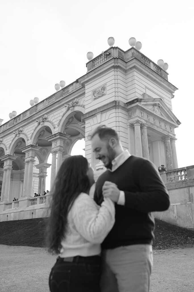 Surprise proposal vienna Portrait of engaged couple at gloriette Vienna
